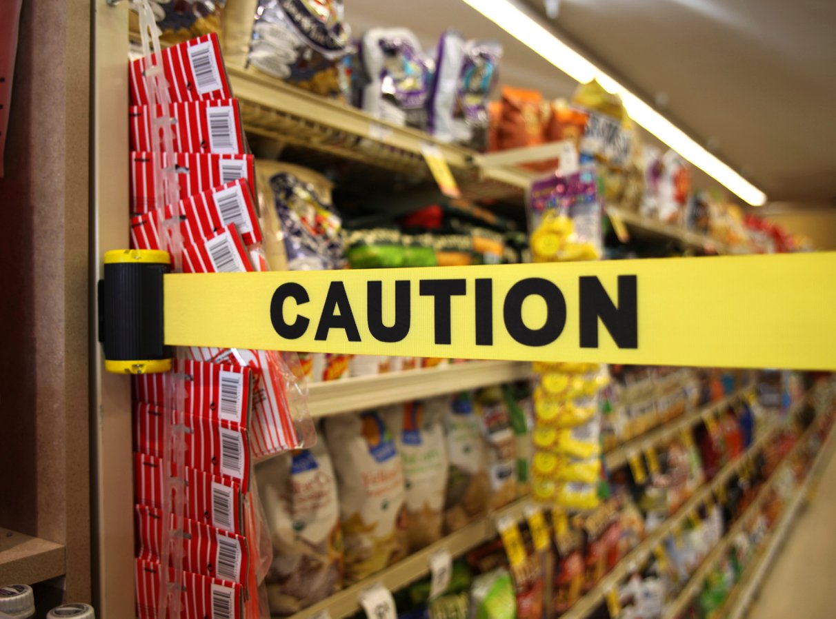 image of caution barrier blocking store asile