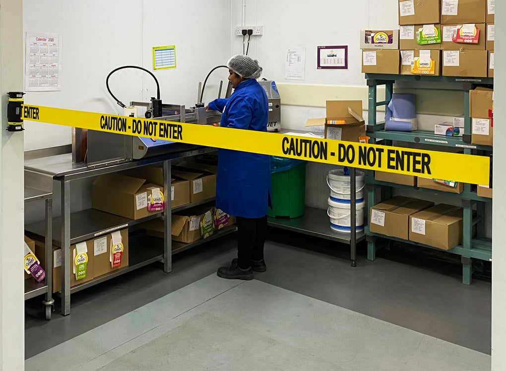 image of caution barrier in food prep area