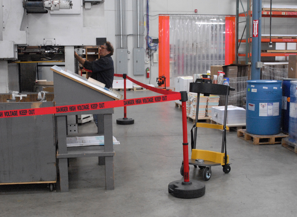 image of safety barrier dividing space in warehouse